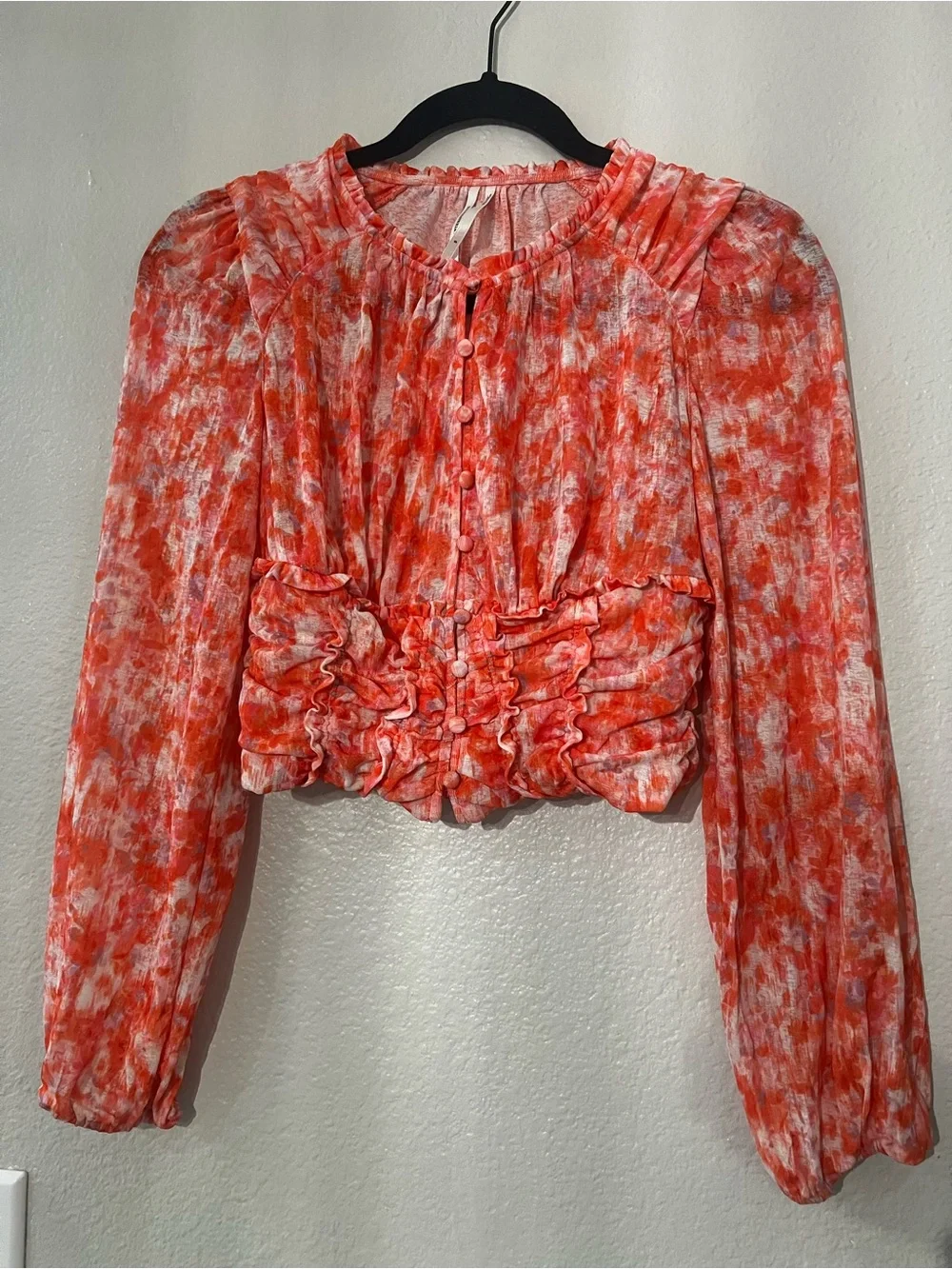 Anthropologie women’s Red-Orange Printed Ruffled Button-Front Top. Preowned
